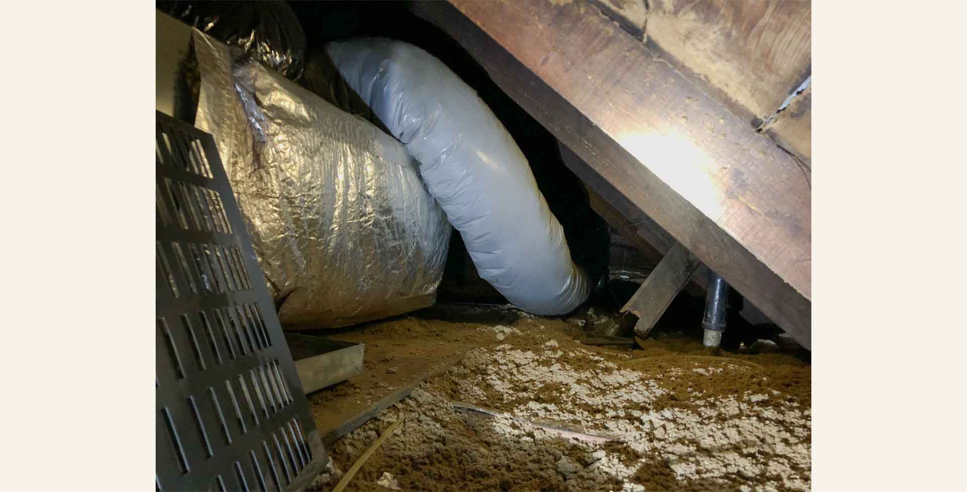 Attic showing insulation and ducts
