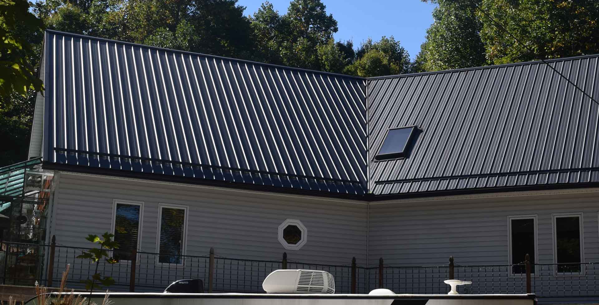 metal roof on a house with a black shiny metal roof